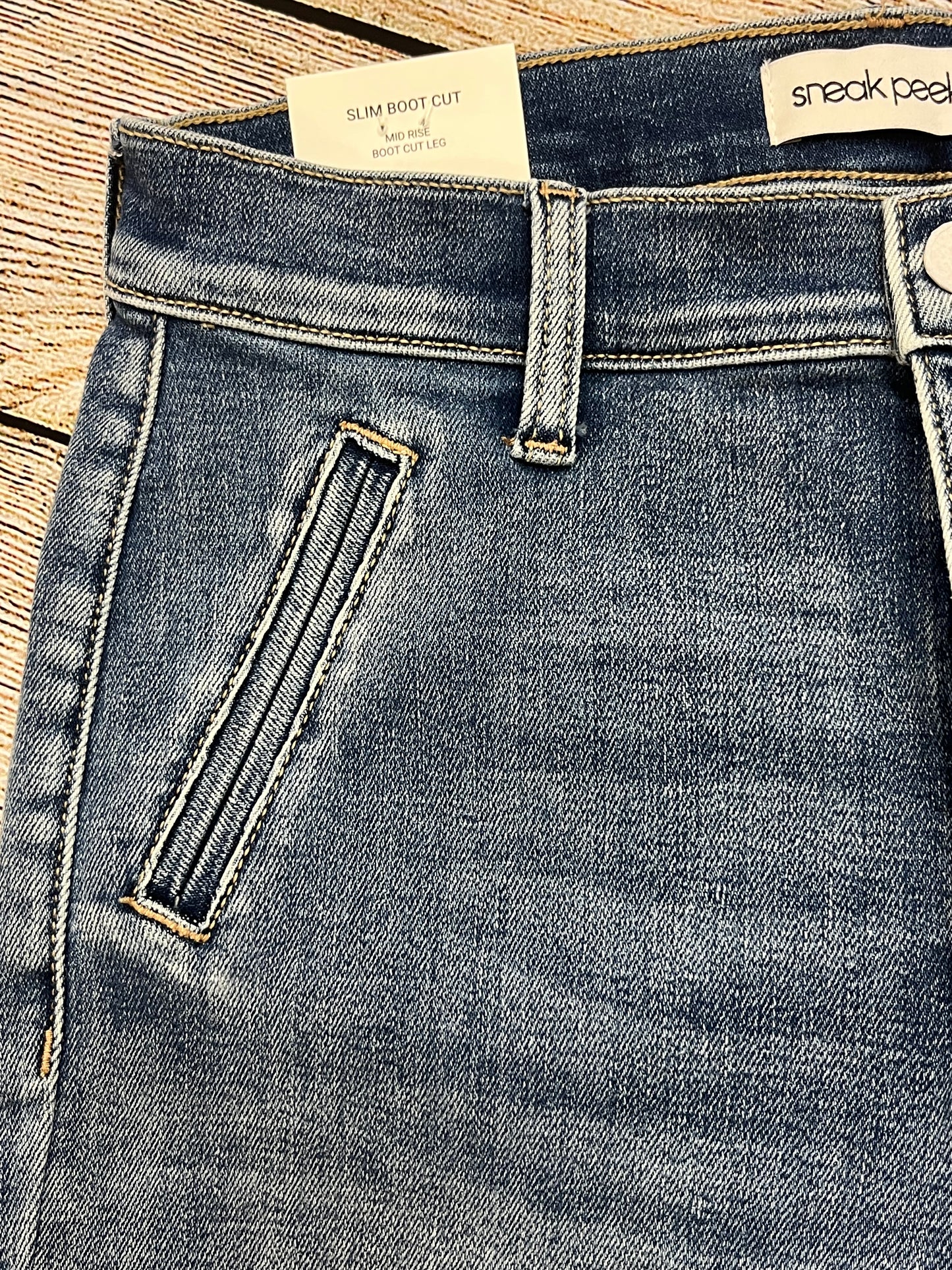 Sneak Peek Slim Boot Cut Mid Rise Jeans